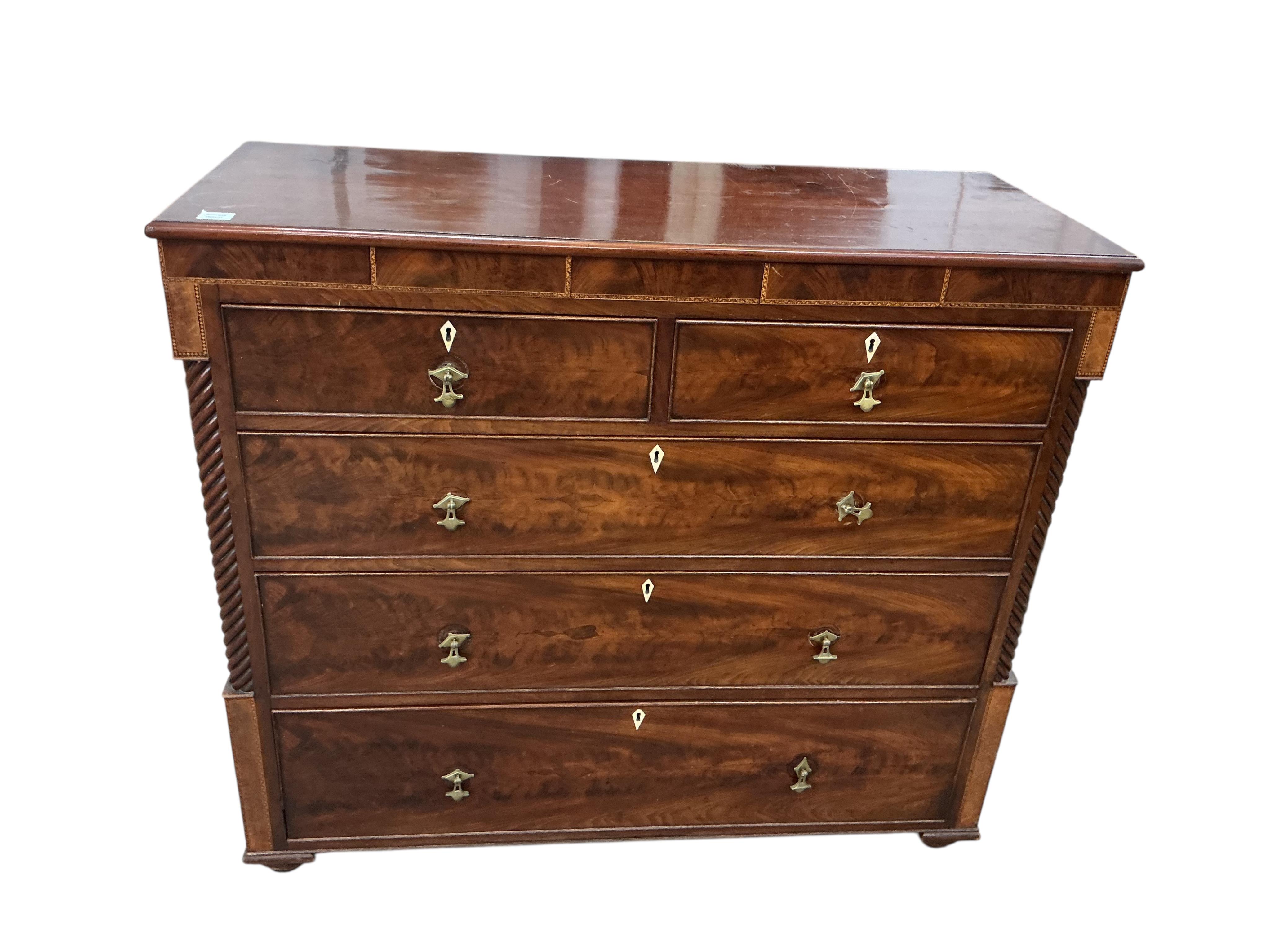 A George IV mahogany chest of drawers, canted corners and bone escutcheons, width 129cm, depth 53cm, height 113cm